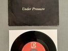 Queen Under Pressure 7” Canada / First Issue: Omits Credits to David Bowie