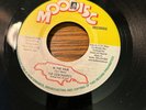 The Debonaires - In The Rain / Spanish Hustle.   NM
