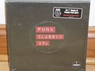 PUNK CLASSIC 45s - BOX SET - VARIOUS - THE DAMNED - UK SUBS - SHAM 69 - SUICIDE