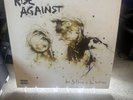The Sufferer and the Witness by Rise Against (Record, 2006)