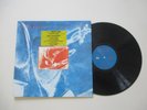 VINYLE 33T DIRE STRAITS ON EVERY STREET TBE AVEC STICKER CONCERT RARE JAMAIS VU