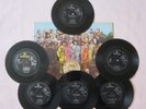 THE BEATLES, Sgt Pepper original LP sleeve and 6 original Parlophone 45 singles.