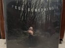 Movements Feel Something Vinyl - New Wide / Black