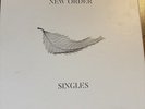 New Order Singles vinyl 4 LP ( Pre-owned) Never Played. Limited Box Set