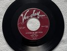 Jimmy Reed on Vee-Jay 119 “Boogie in the Dark”