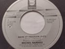 CANADA  NM- MICHEL SARDOU Biere et Fraulein / Elle S'en Va De Moi 1984 45
