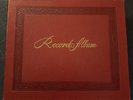 Vintage Red Record 45 RPM Album of  Chuck Berry 45’s.  (13 Records)