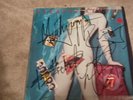 SIGNED ROLLING STONES ALBUM (UNDERCOVER, 1983) BY FOUR MEMBER) BY FOUR MEMBERS